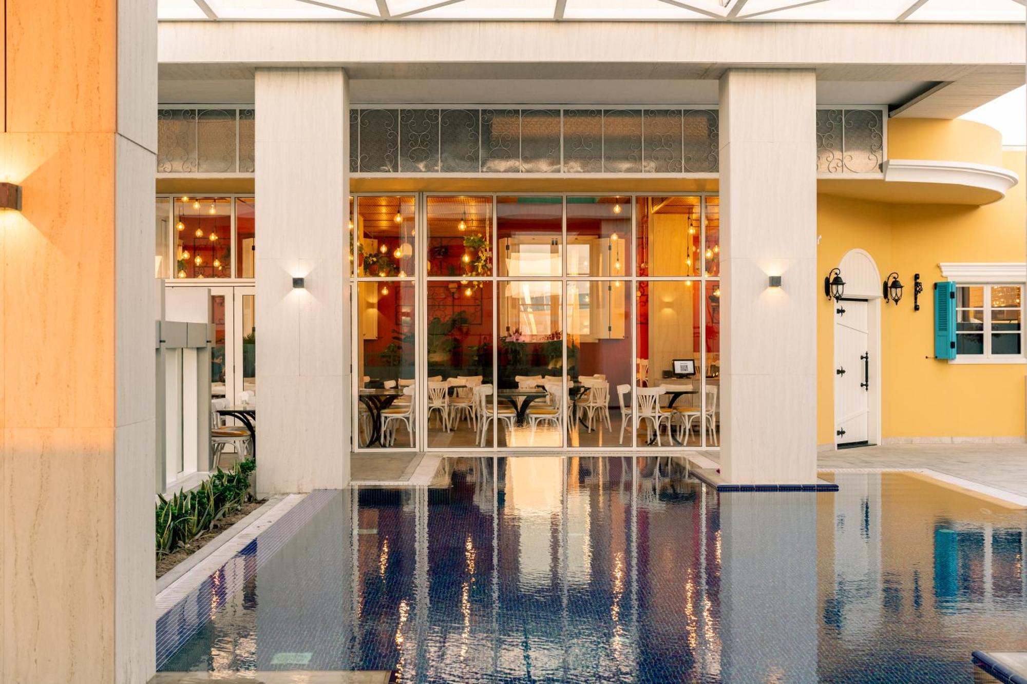 Millennium Place โดฮา ภายนอก รูปภาพ The interior of the building