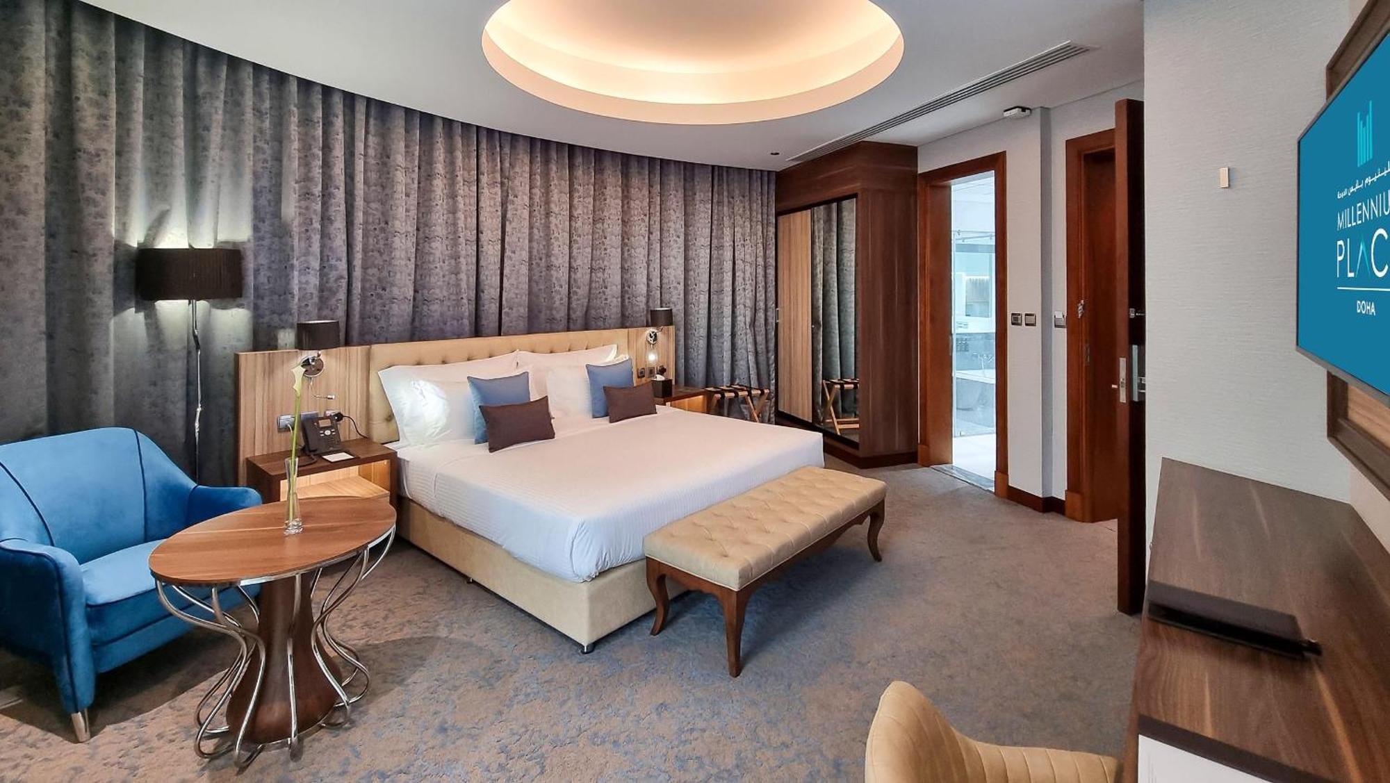 Millennium Place โดฮา ภายนอก รูปภาพ A bedroom at the hotel