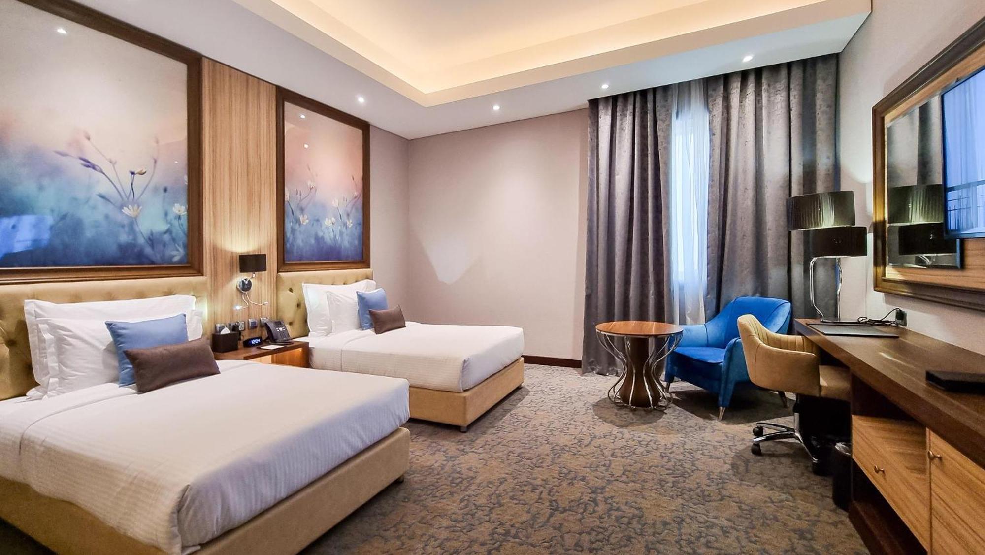 Millennium Place โดฮา ภายนอก รูปภาพ Deluxe Room